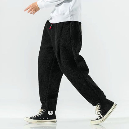 Stylish women's warm casual pants, featuring a relaxed fit for cozy winter comfort and everyday wear.