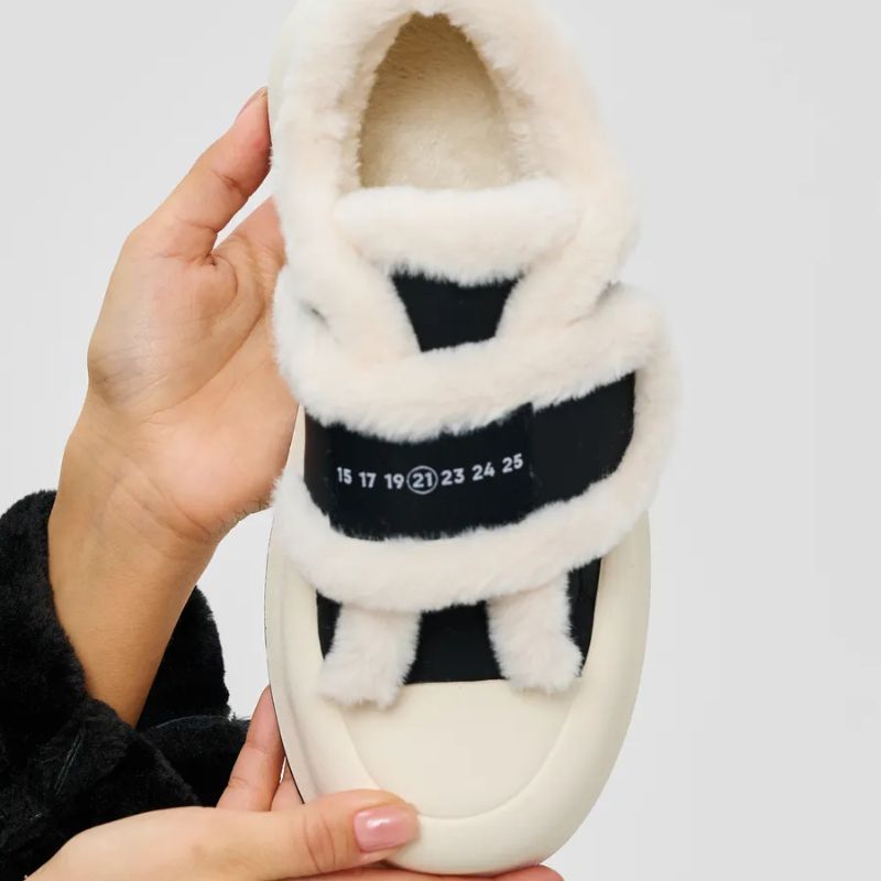 Chic women's warm slip-on winter shoes, ideal for everyday seasonal fashion & cozy wear.