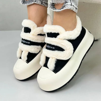 Plush & warm women's slip-on winter shoes, offering supreme comfort for cold weather.