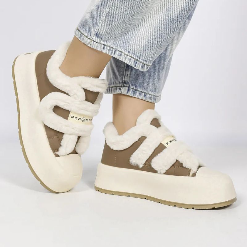Fashionable women's warm winter slip-on shoes, merging cozy comfort with chic seasonal style.