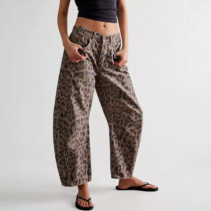 Comfortable women's relaxed fit barrel jeans in a trendy washed leopard print, great for vintage-inspired casual wear.
