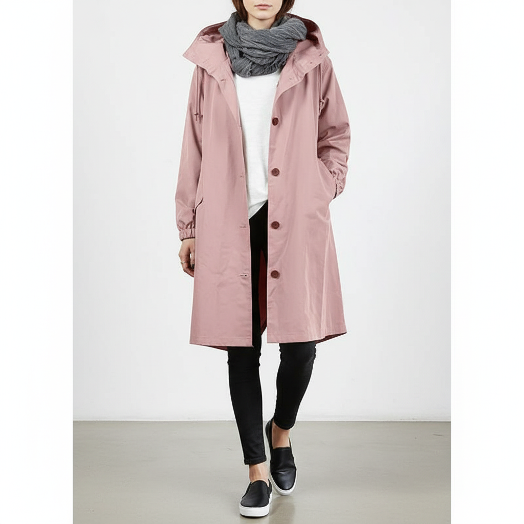 Stylish women's lightweight, water resistant rain jacket with hood. Ideal for spring & fall outdoor wear.
