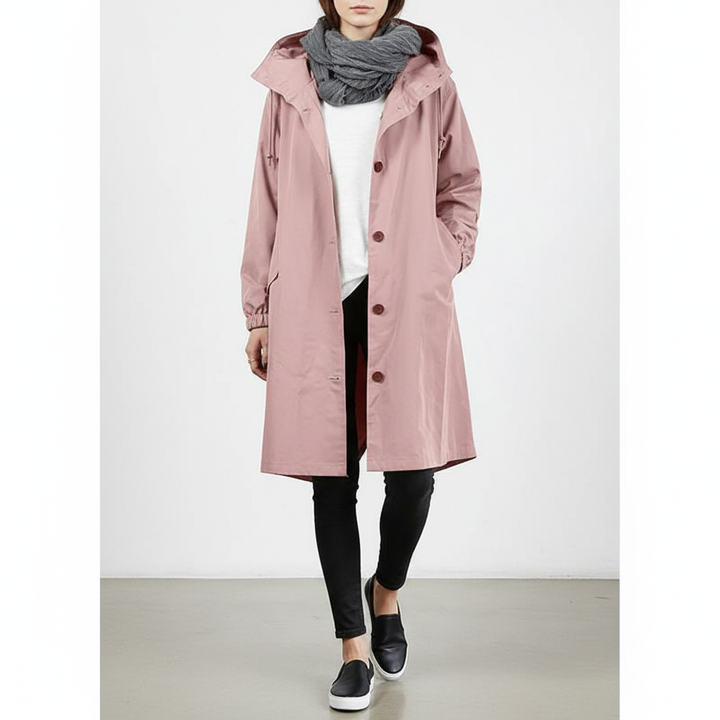 Stylish women's lightweight, water resistant rain jacket with hood. Ideal for spring & fall outdoor wear.