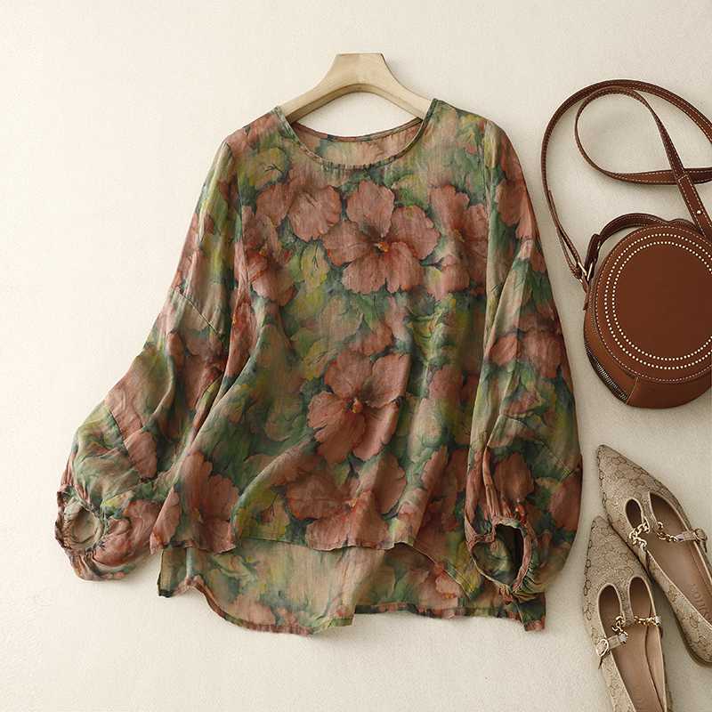 Women's watercolor floral blouse in green & blue, long sleeve, loose fit for an elegant, airy spring/summer style.