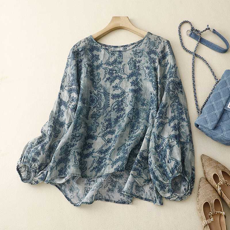 Casual women's long sleeve blouse with beautiful green & blue watercolor floral print, comfortable loose fit.