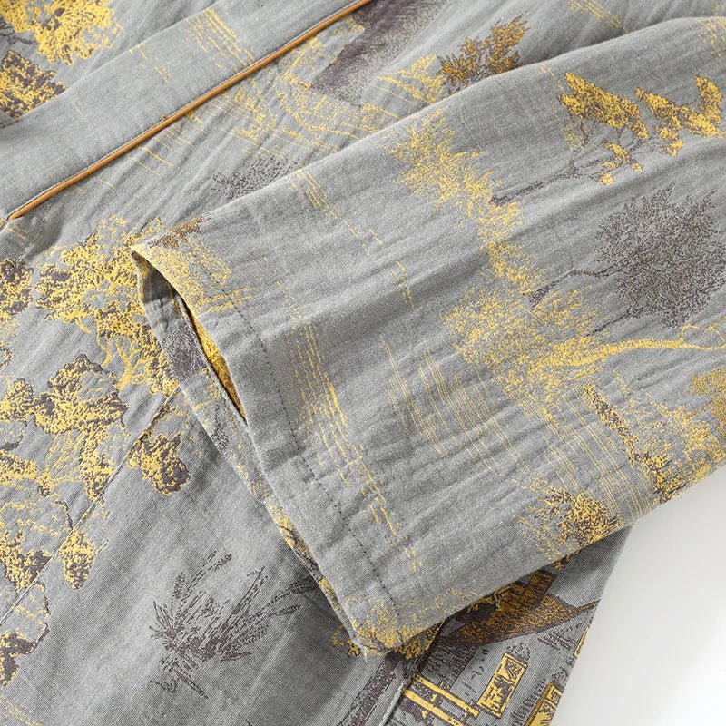 Comfortable women's two-piece nightwear set with a flowing watercolor kimono top and relaxed pajama pants.