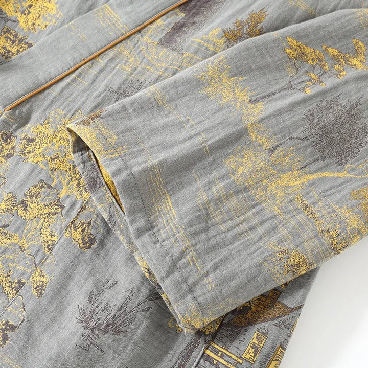 Comfortable women's two-piece nightwear set with a flowing watercolor kimono top and relaxed pajama pants.