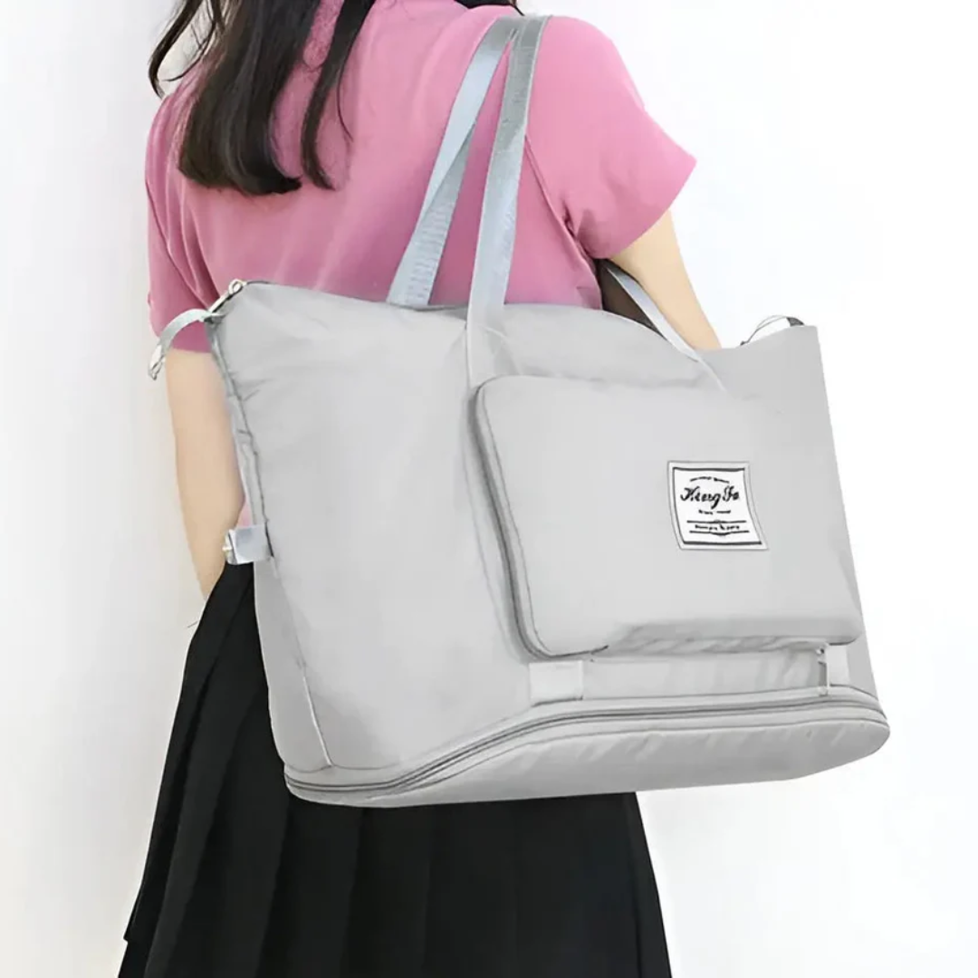 Durable waterproof travel duffel bag for women, perfect for protecting essentials on gym trips or weekend getaways.