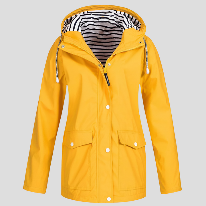 Women's waterproof hooded rain jacket, lightweight for all-weather protection and travel.