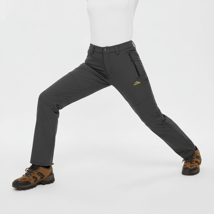 Women's waterproof insulated Lydia pants, black, for winter hiking & cold weather outdoor adventures.