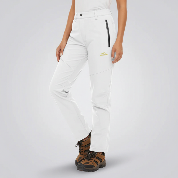 Stylish women's Lydia waterproof insulated outdoor pants, perfect for winter activewear, hiking & travel.