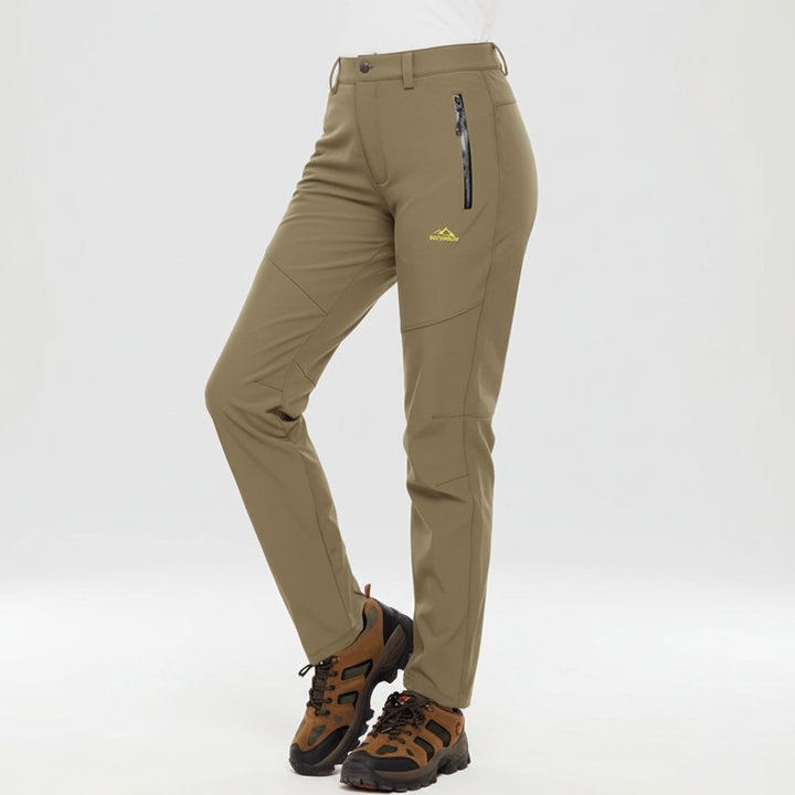 Versatile women's Lydia waterproof insulated pants, great for travel, casual wear, and winter outdoor activities.