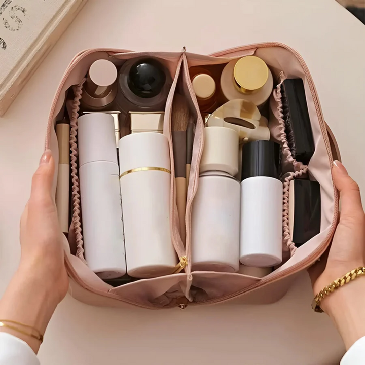 Portable waterproof travel bag for women, ideal as a makeup organizer & toiletry storage solution.