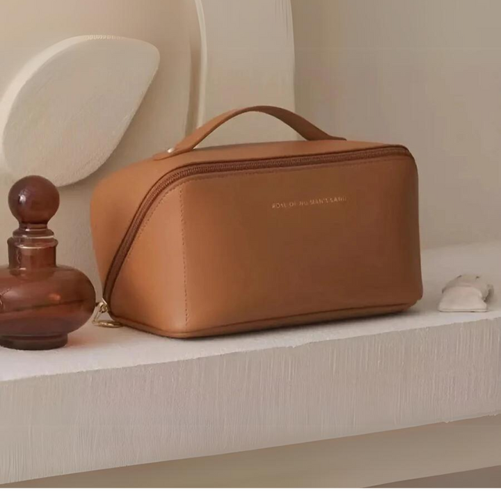 Securely store makeup & toiletries in this waterproof travel cosmetic bag, a women's accessory.