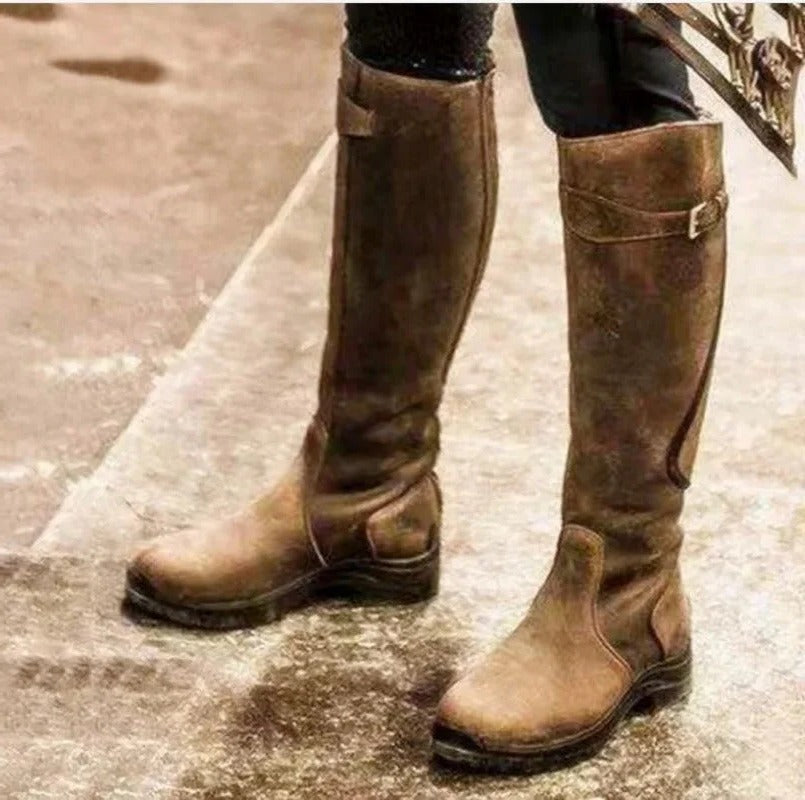 Durable women's waterproof winter boots, keeps feet warm & dry, non-slip traction for icy conditions.
