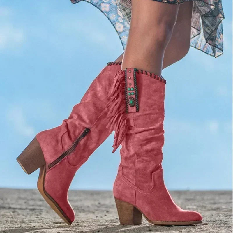 Women's Western mid-calf boots with playful fringe and turquoise studs. Perfect for boho chic style or festival wear.