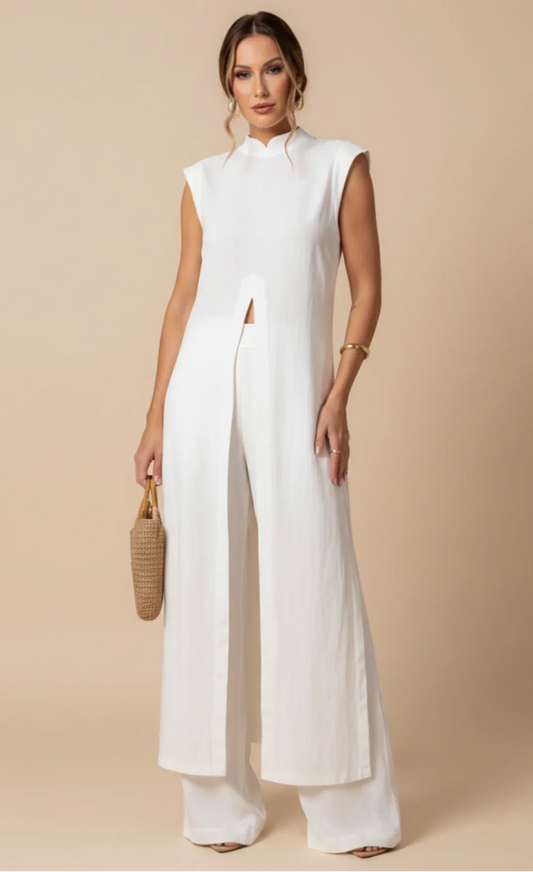 Women's white boho two-piece set, featuring a flowy tunic top and wide-leg pants, perfect for summer beachwear.