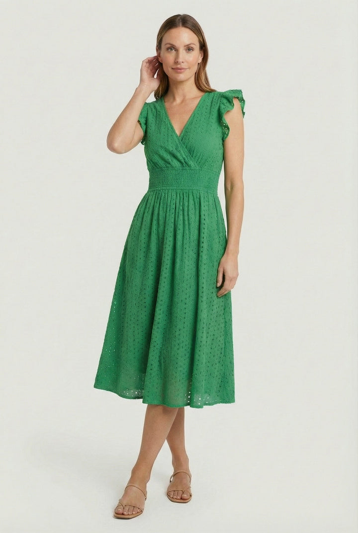 Comfortable women's white eyelet midi dress with ruffled sleeves & smocked waist, perfect for warm weather casual wear.