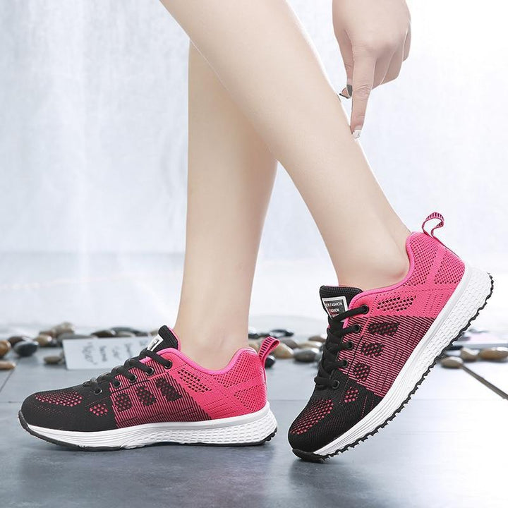 Women's supportive walking shoes, breathable mesh upper, comfort-focused for active lifestyles.
