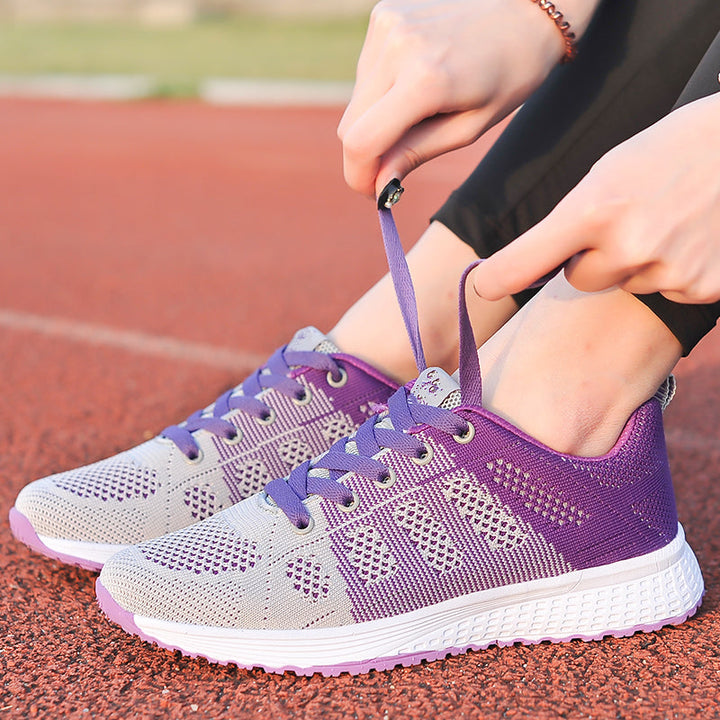 Breathable lace-up women's athletic walking shoes, supportive for everyday wear & comfort.
