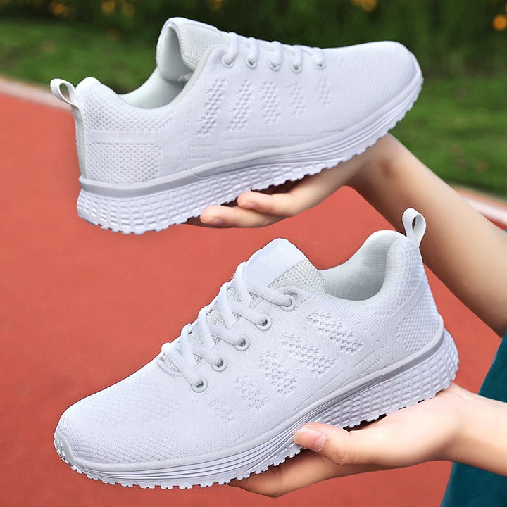 Women's athletic walking shoes, arch support, breathable for everyday comfort & foot health.