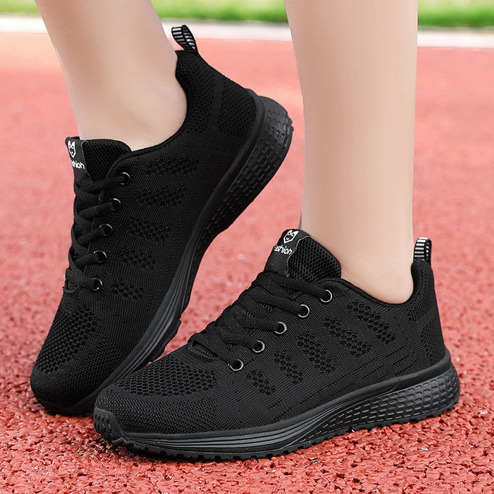 Athletic women's walking shoes, breathable, non-slip, for active comfort & daily support.