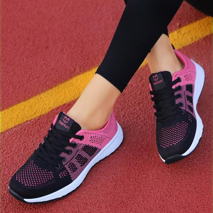 Lace-up women's athletic walking shoes, superior support, cushioning, & breathability for comfort.