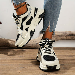 Stylish women's platform sneakers featuring a thick sole. Perfect for everyday wear, offering comfort & trendy style.