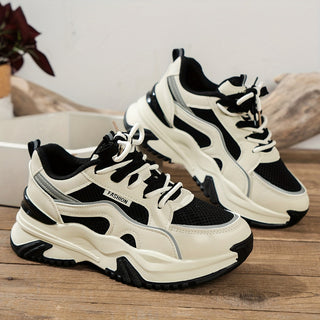 Fashion-forward women's platform sneakers with a thick sole, ideal for sporty chic looks & casual outings.