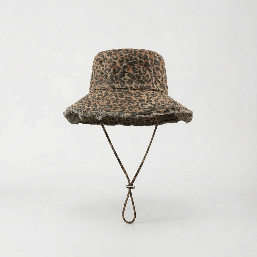 Packable women's wide brim sun hat, ideal for travel & beach trips, offers great sun protection.