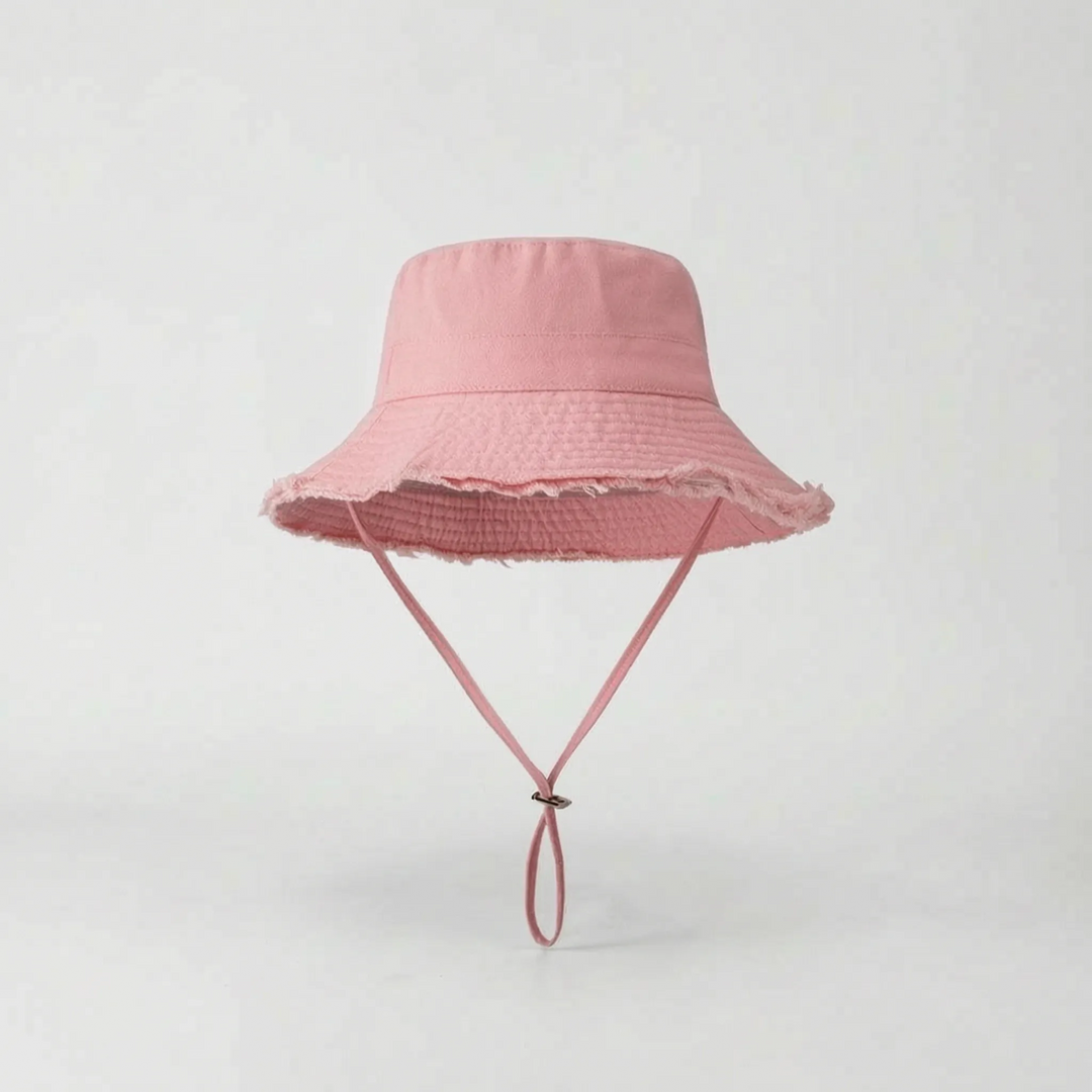 Classic solid color wide brim bucket hat for women, essential for beach, pool & outdoor sun protection.