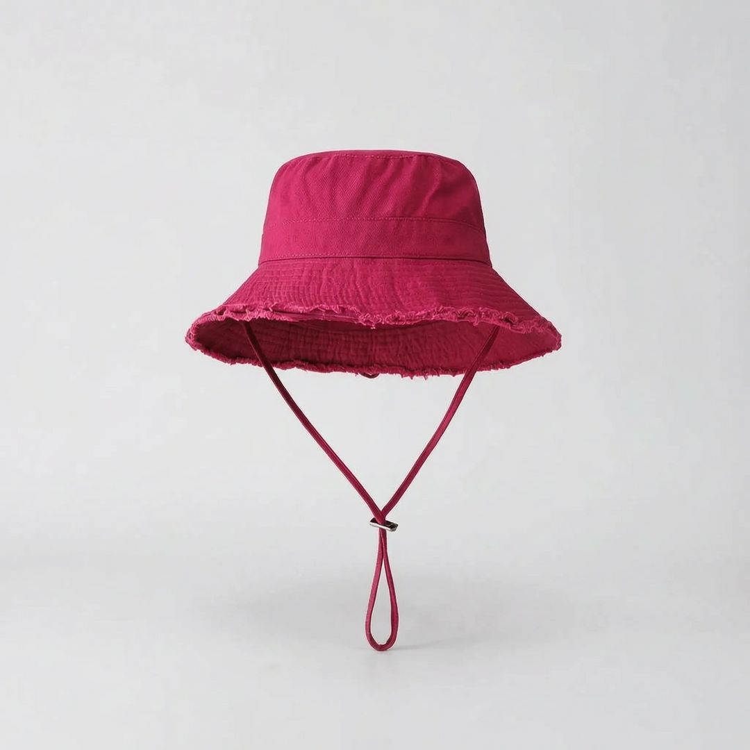 Elegant women's wide brim bucket hat, a summer fashion accessory offering superb sun protection.