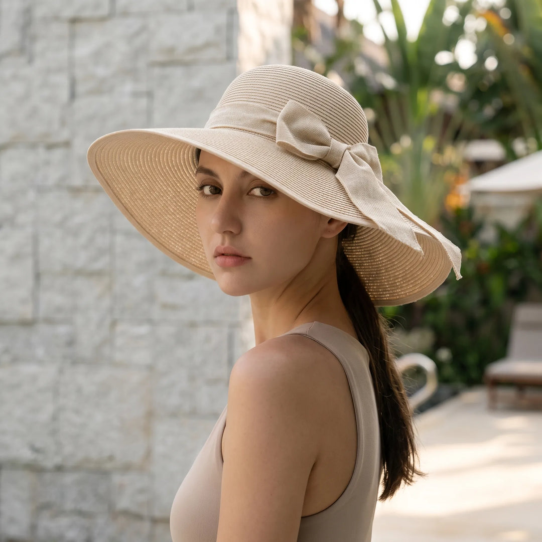 Women's wide brim foldable sun hat, perfect for beach, travel, and summer vacation.