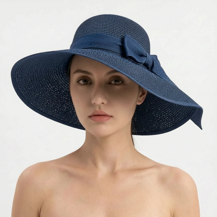 Women's summer wide brim hat, an accessory that's both stylish and practical for sun protection.