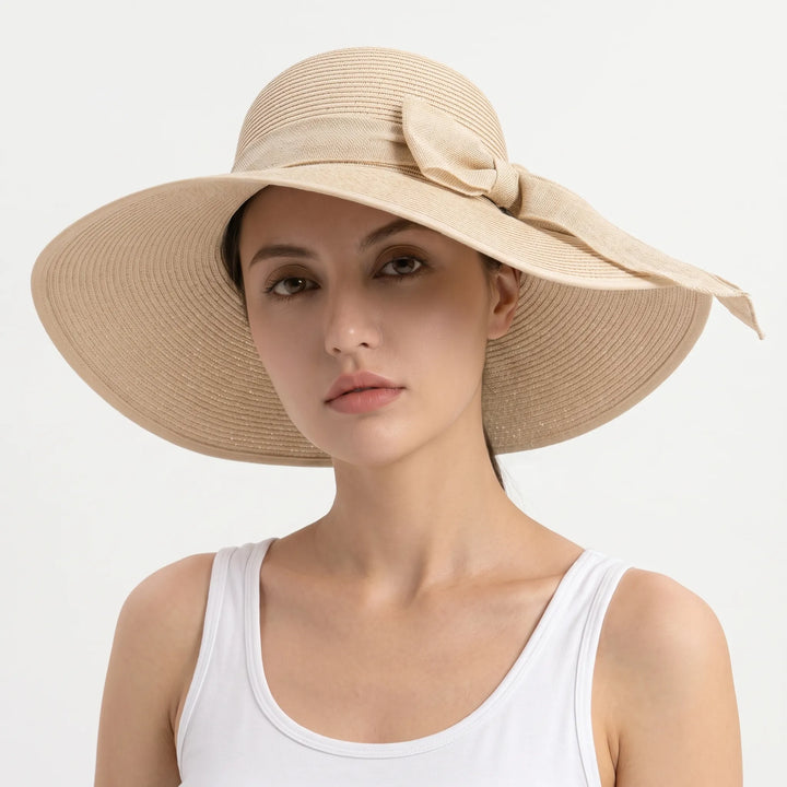 Stylish women's foldable travel hat with a wide brim for ultimate sun protection.