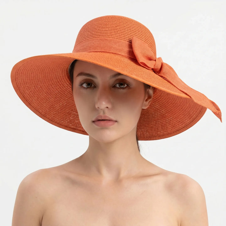 Beach-ready women's wide brim sun hat, easily foldable and packable for any destination.