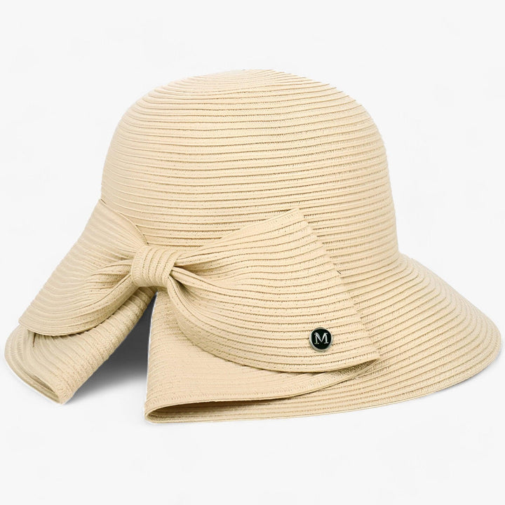 Stylish women's wide brim panama straw sun hat in khaki, perfect for summer beach and UV protection.