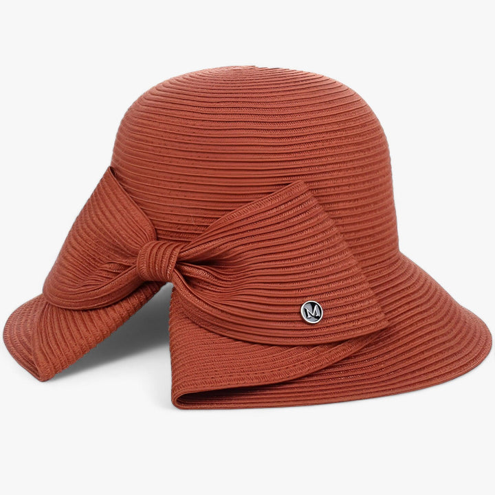 Khaki wide brim sun hat for women, ideal for beach trips & travel. Offers excellent UV protection & style.