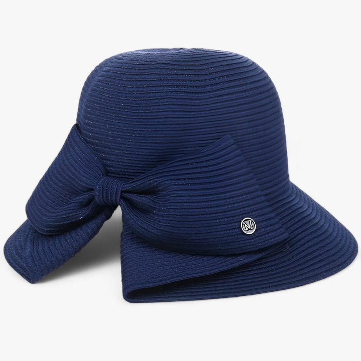 Elegant khaki wide brim straw sun hat for women, essential for beach, travel, & UV protection in summer.