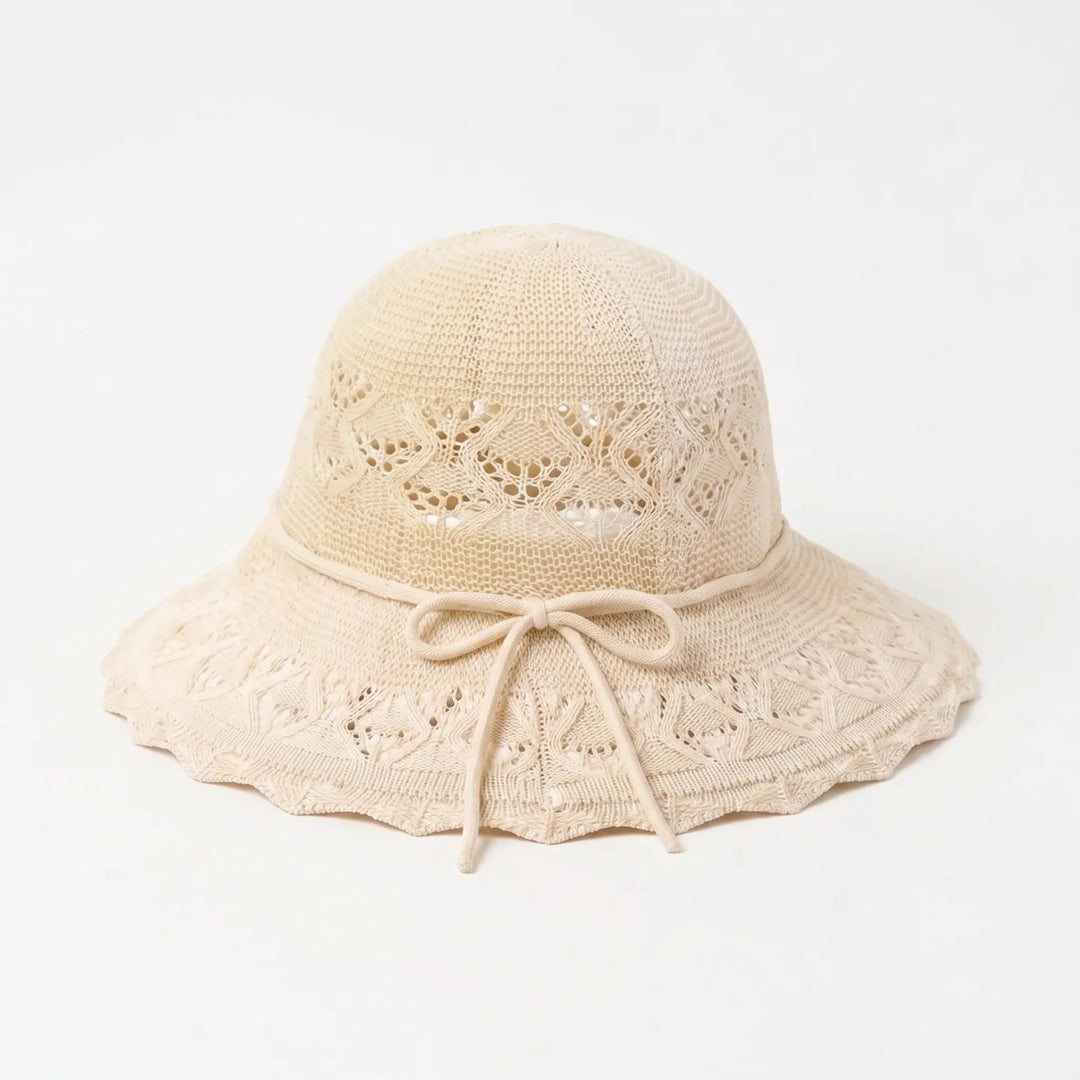 Fashionable women's wide brim sun hat. A versatile accessory for summer, beach, & outdoor wear.