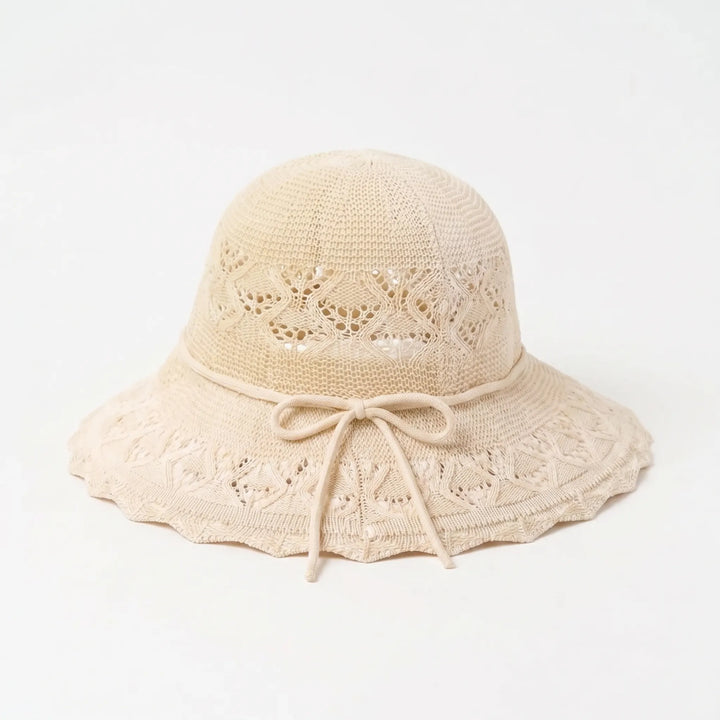 Fashionable women's wide brim sun hat. A versatile accessory for summer, beach, & outdoor wear.