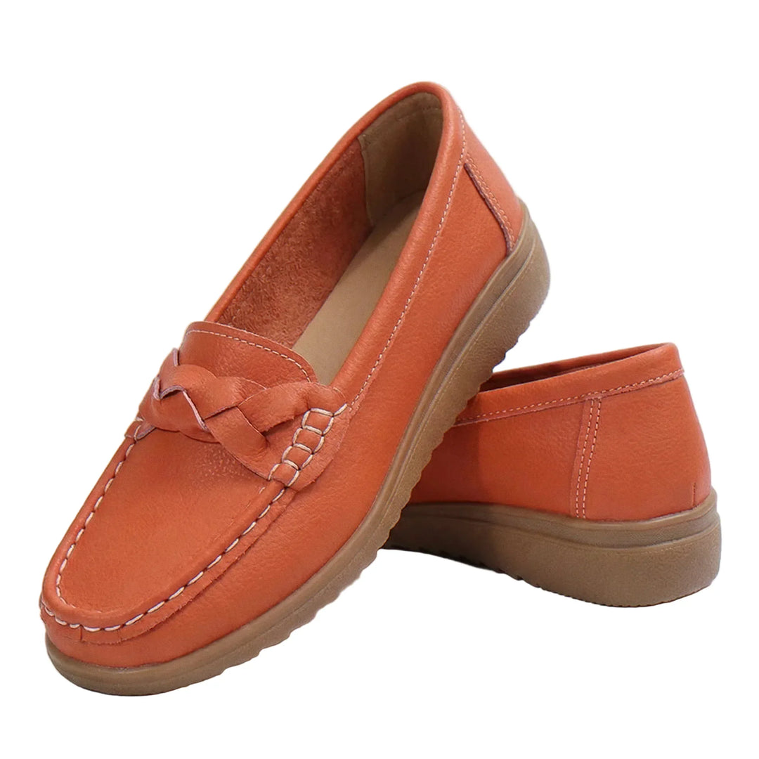 Women's wide fit orthopedic loafers in black, offering slip-on convenience & arch support for comfort.