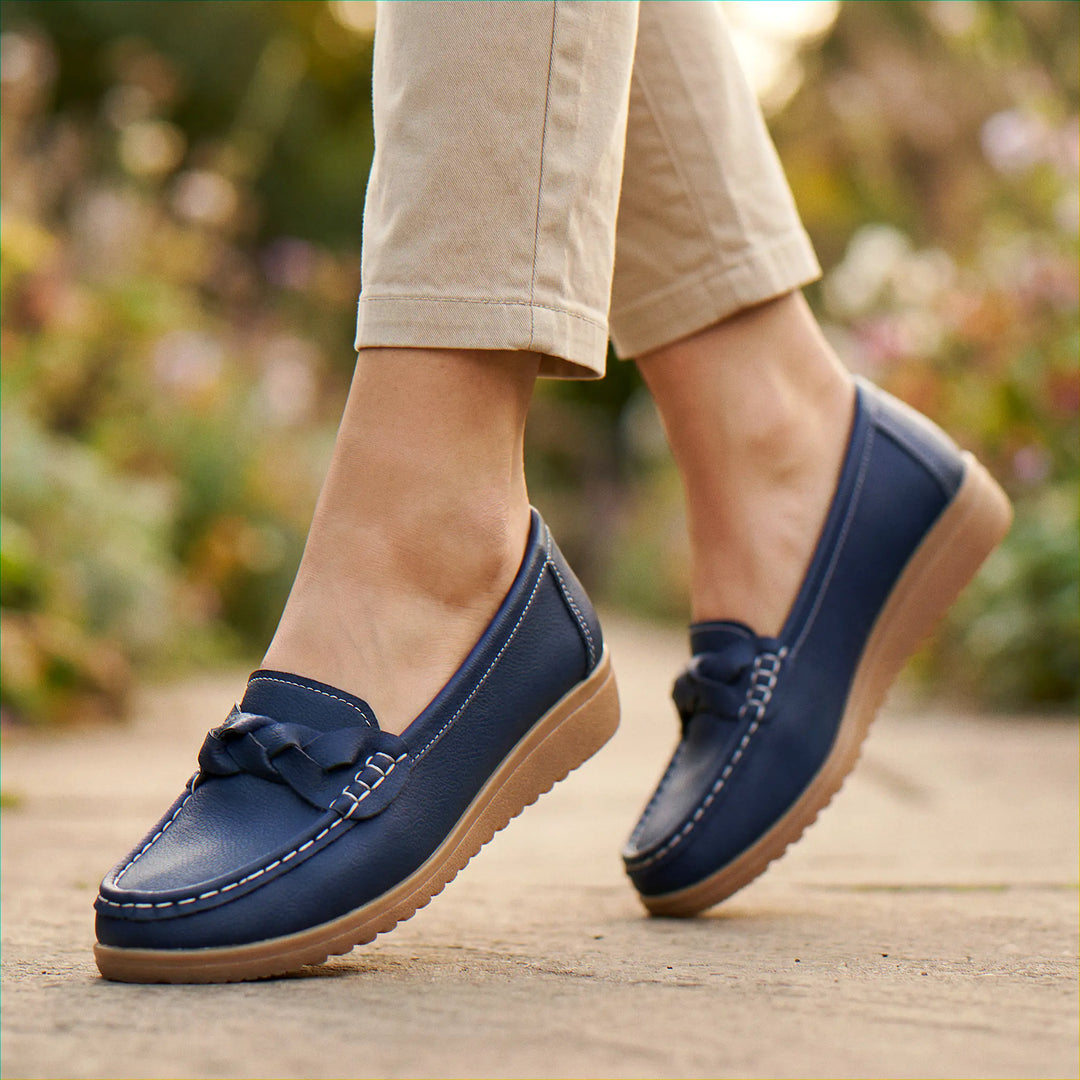 Textured upper of women's wide fit orthopedic loafers, providing slip-on ease & crucial arch support.