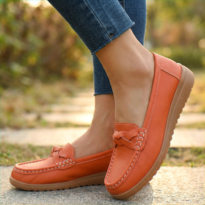 Women's casual wide fit loafers, engineered as slip-on orthopedic shoes for maximum arch support.