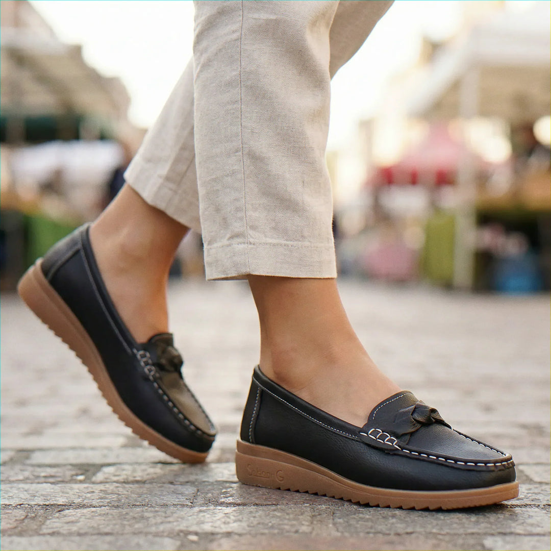 Foot pain relief with women's wide fit slip-on loafers, featuring advanced orthopedic arch support.