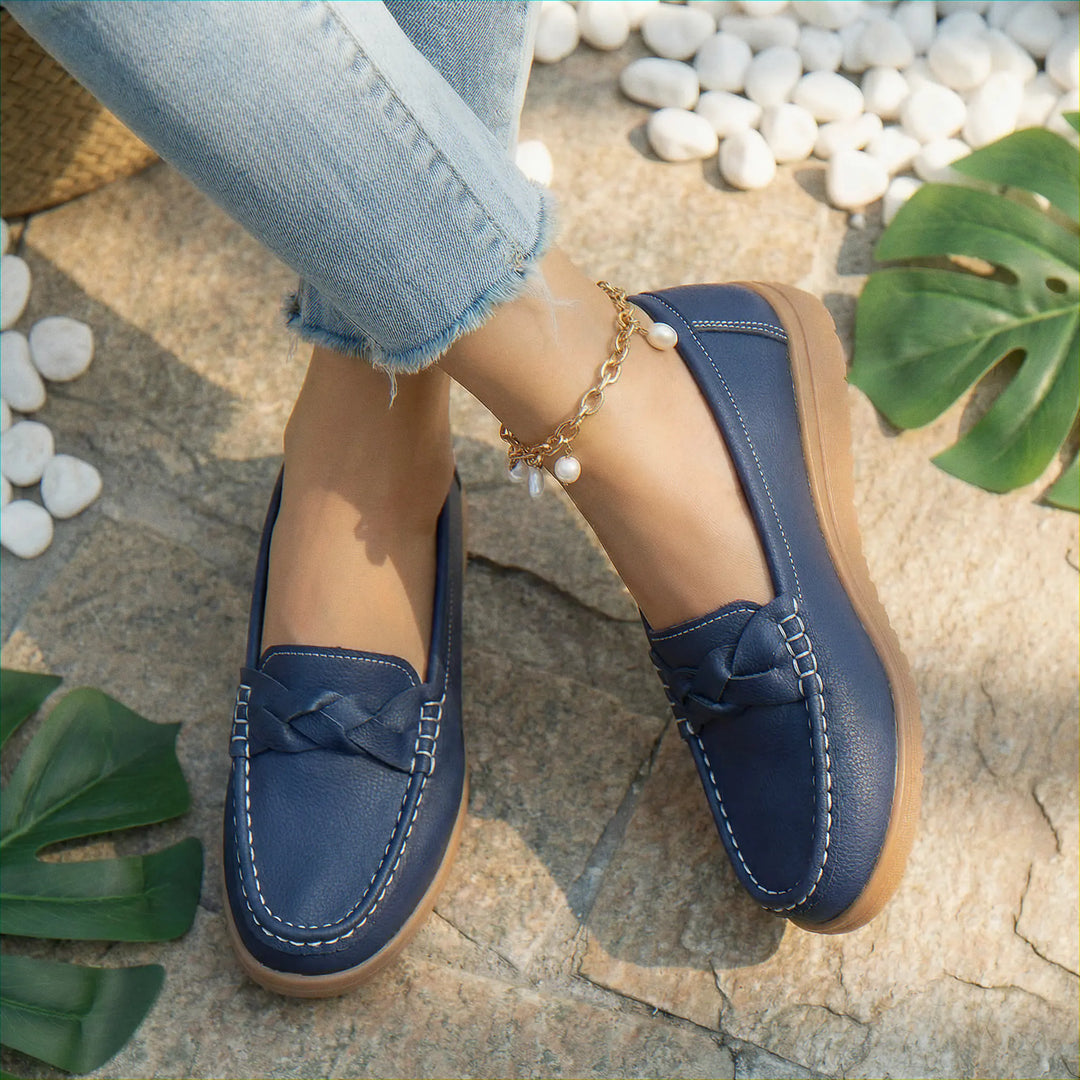 Casual women's loafers, providing wide fit comfort and orthopedic arch support in a slip-on style.