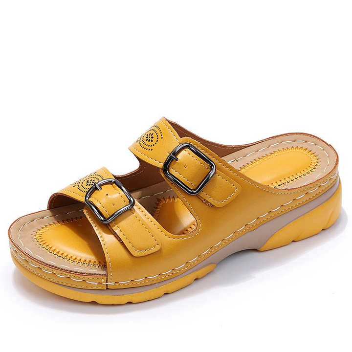 Orthopedic women's wide fit sandals featuring arch support & a soft cushioned sole for comfort.