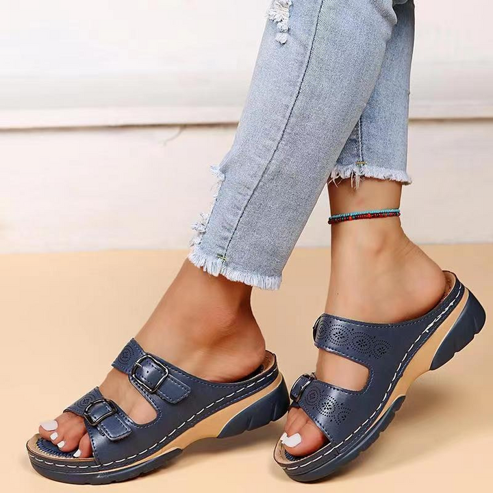 Women's orthopedic sandals with a cushioned sole and wide fit, perfect for foot health and summer wear.