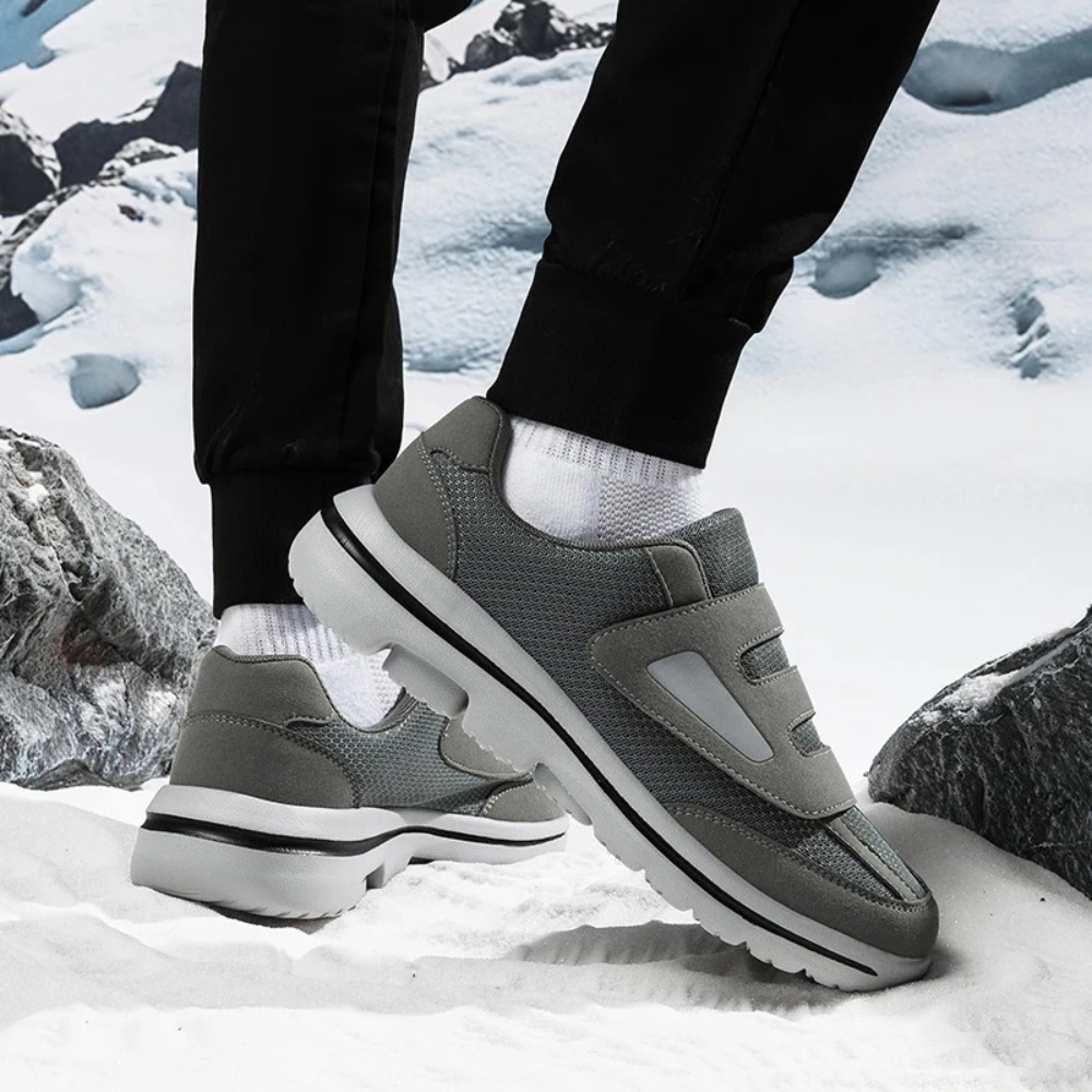 Durable non-slip sole of women's orthopedic slip-on walking shoe, wide fit for stability & daily wear.