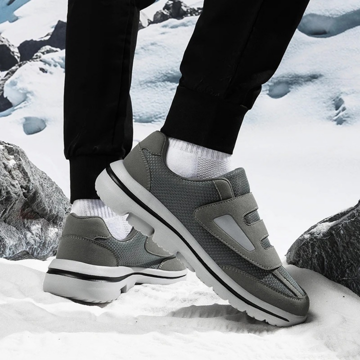 Durable non-slip sole of women's orthopedic slip-on walking shoe, wide fit for stability & daily wear.